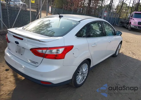 2014 Ford Focus Titanium из США, поврежденный, VIN 1FADP3J21EL367595